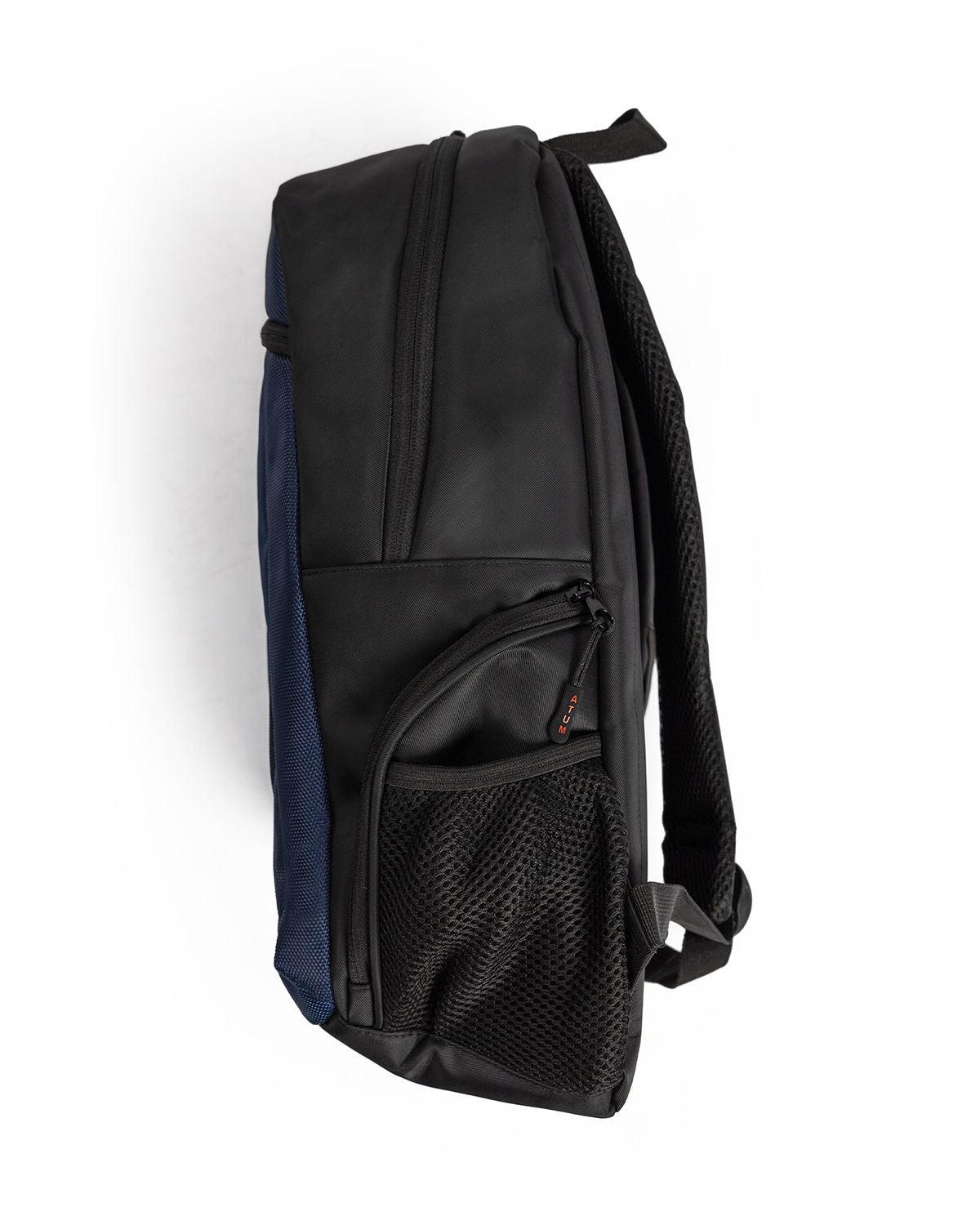 Photo by ð—”ð—§ð—¨ð— SPORTSWEAR Â® on December 26, 2022. May be a navy premium backpack.